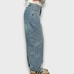 Nolene – Jeans con finitura scintillante e carattere urbano