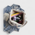 Tilda – Borsa tote a coste con cordoncino