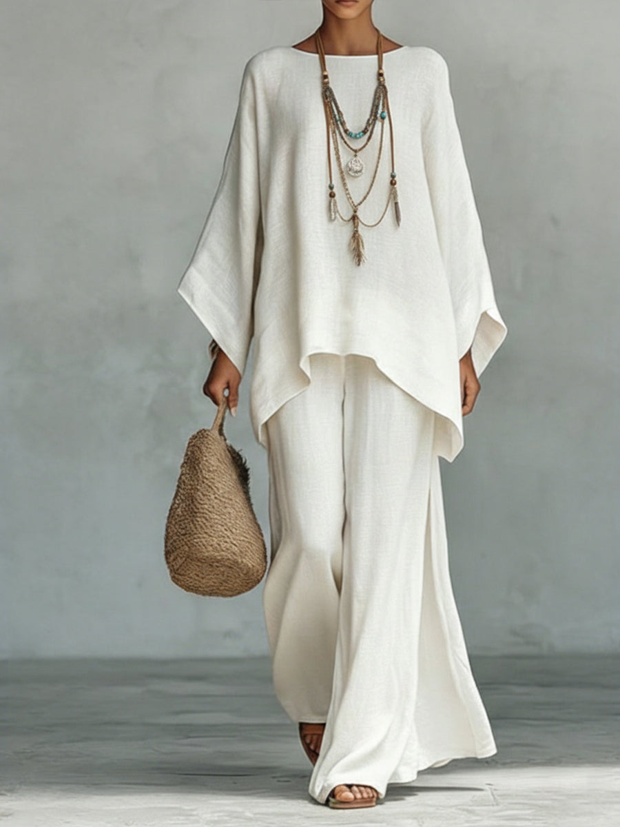 Conjunto de duas peças para mulher, composto por top e calças largas, em linho e algodão, confortável e de corte largo.