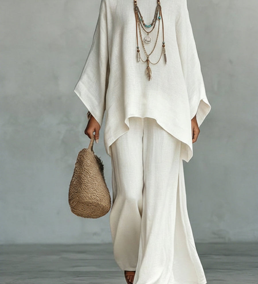 Conjunto de duas peças para mulher, composto por top e calças largas, em linho e algodão, confortável e de corte largo.
