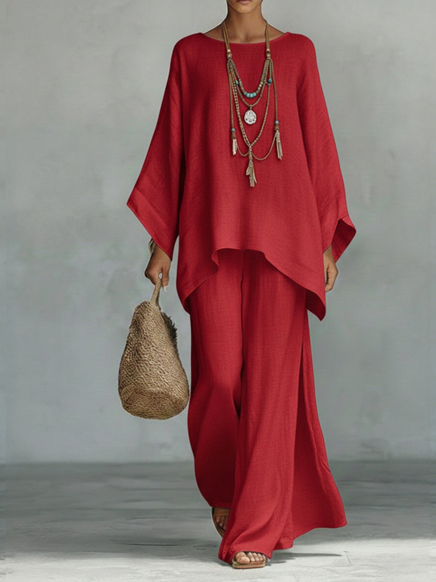 Conjunto de duas peças para mulher, composto por top e calças largas, em linho e algodão, confortável e de corte largo.