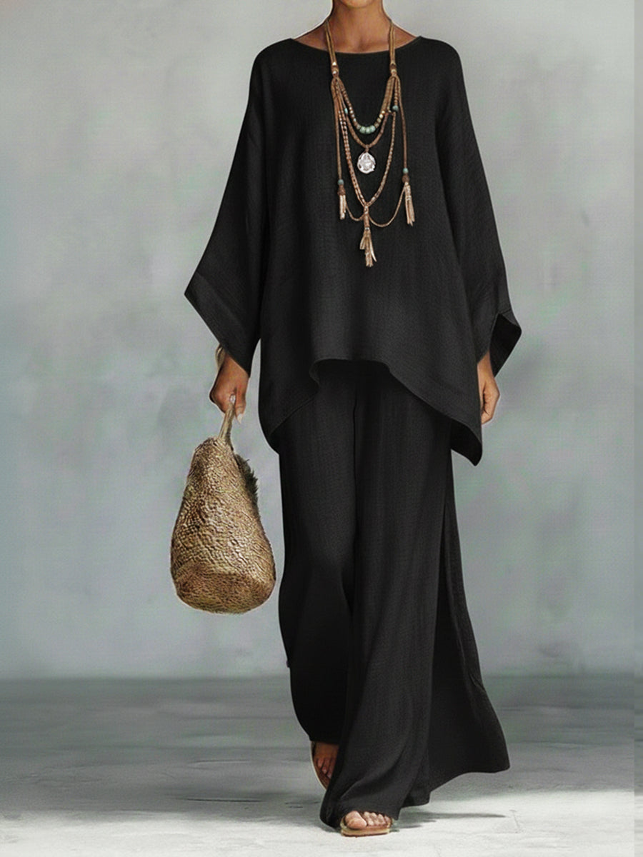 Conjunto de duas peças para mulher, composto por top e calças largas, em linho e algodão, confortável e de corte largo.